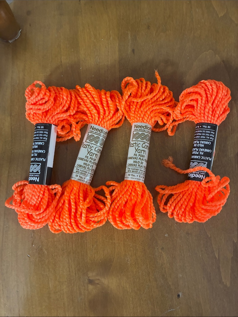 4 needloft orange yarn 10 yards each